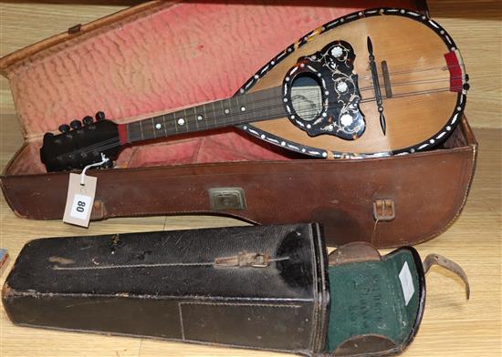 A Pietro Tonelli Napoli mandolin and an ebony and nickel-mounted clarinet